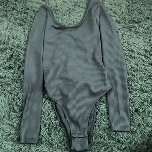 Green bodysuit with open back